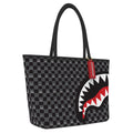 Sac cabas à carreaux gris avec personnage qui regarde