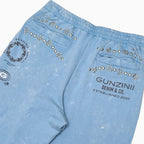 Conjunto de jogger con gráficos y tachuelas para hombre