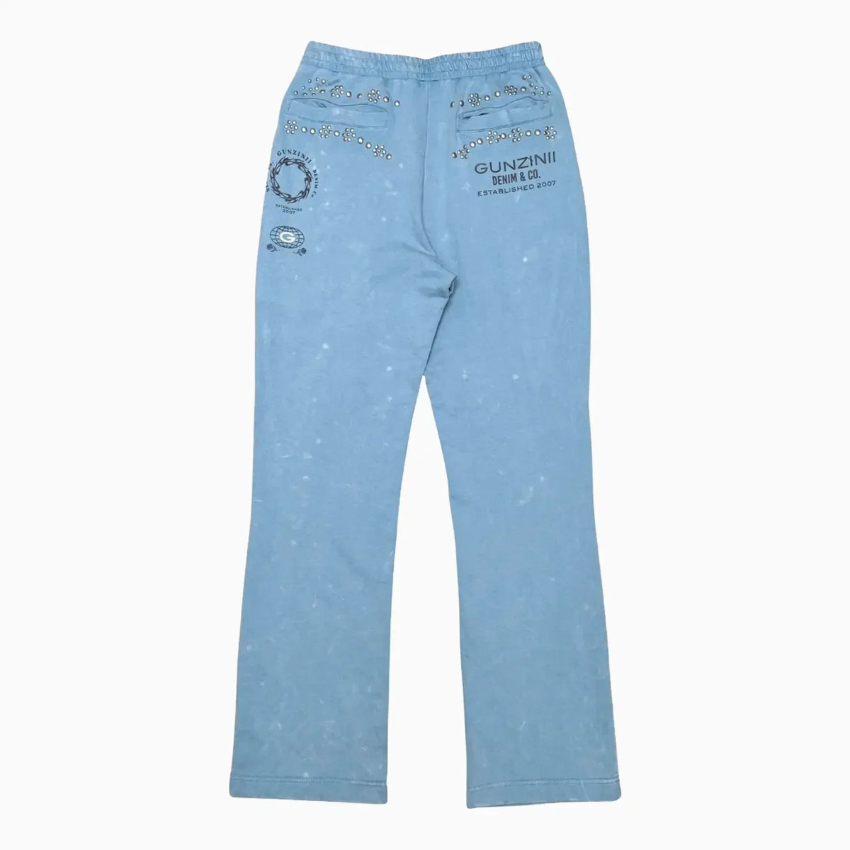 Conjunto de jogger con gráficos y tachuelas para hombre