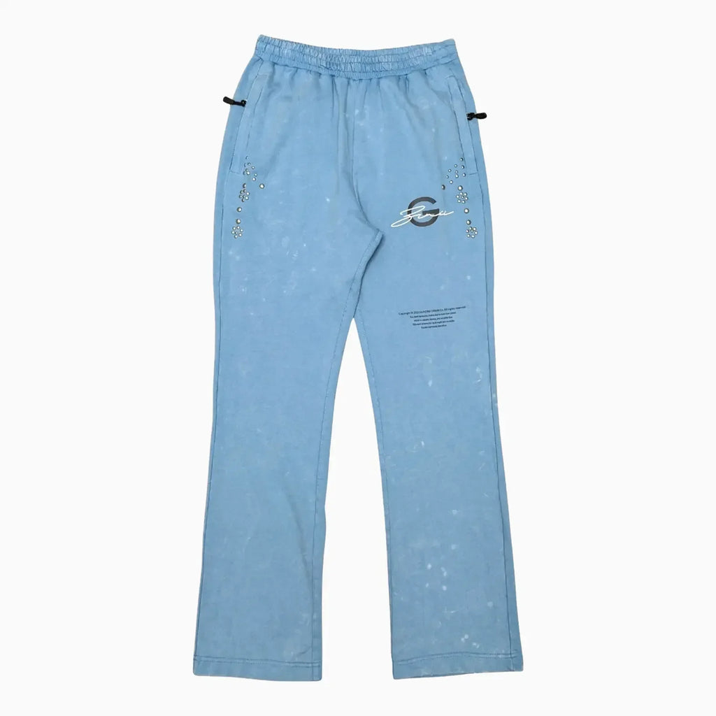 Conjunto de jogger con gráficos y tachuelas para hombre