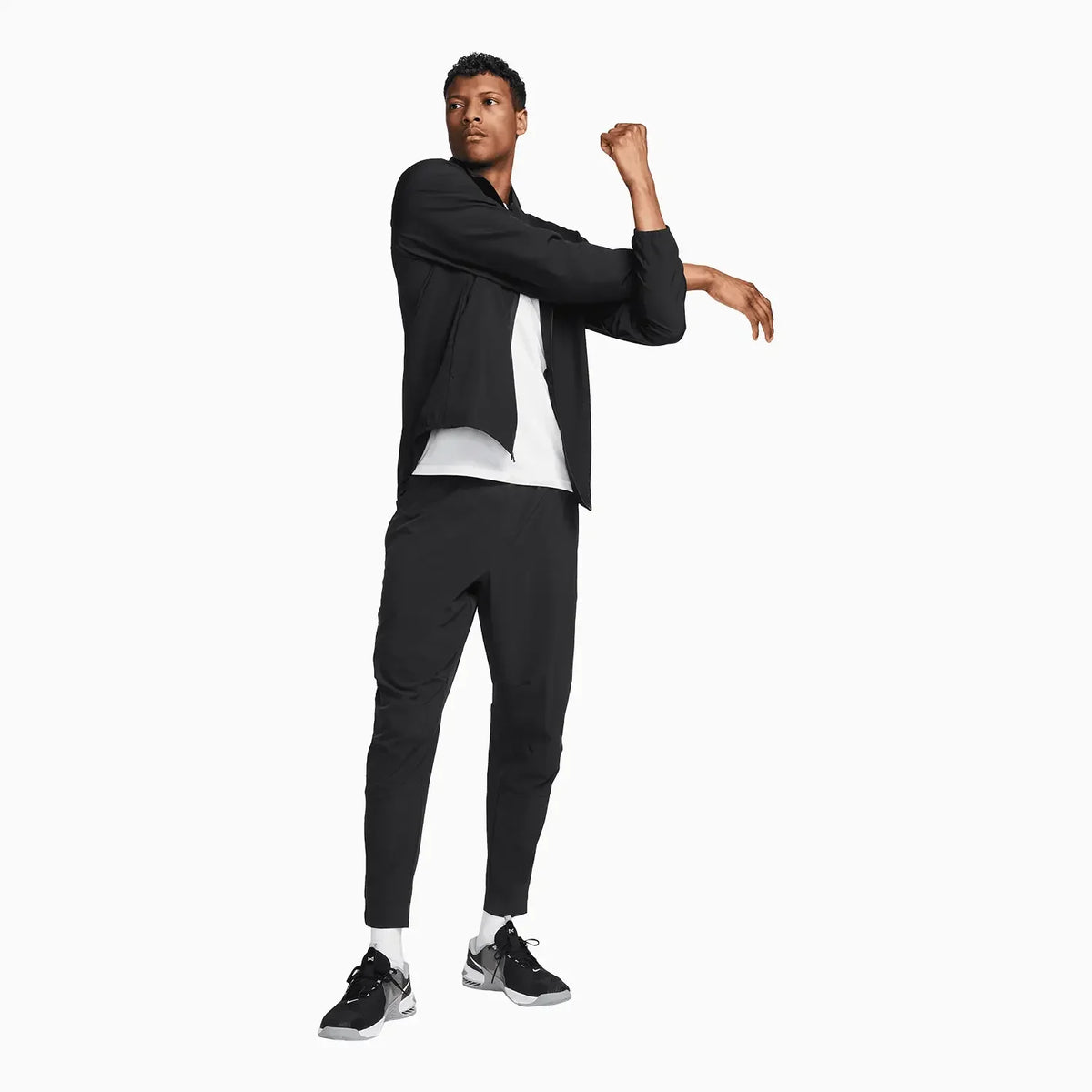 Pantalón deportivo de chándal Dri-Fit ilimitado para hombre con puño con cremallera