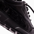 Baskets montantes monogrammées en cuir pour homme