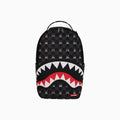 Sac à dos à carreaux gris avec personnage qui dépasse